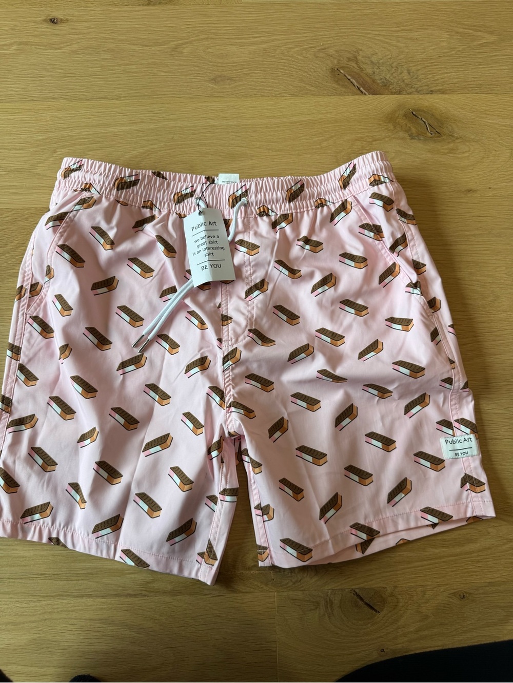 NWT Pink ice cream sandwich Men’s Printed Swim Shorts